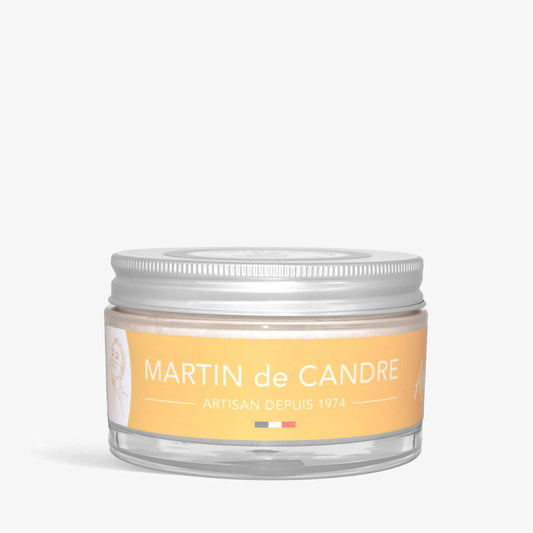 A glass jar of Martin de Candre Citrus shaving soap on a white background