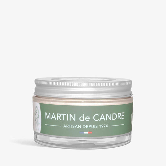 A jar with a green label featuring Martin de Candre Vetyver shaving soap on a white background