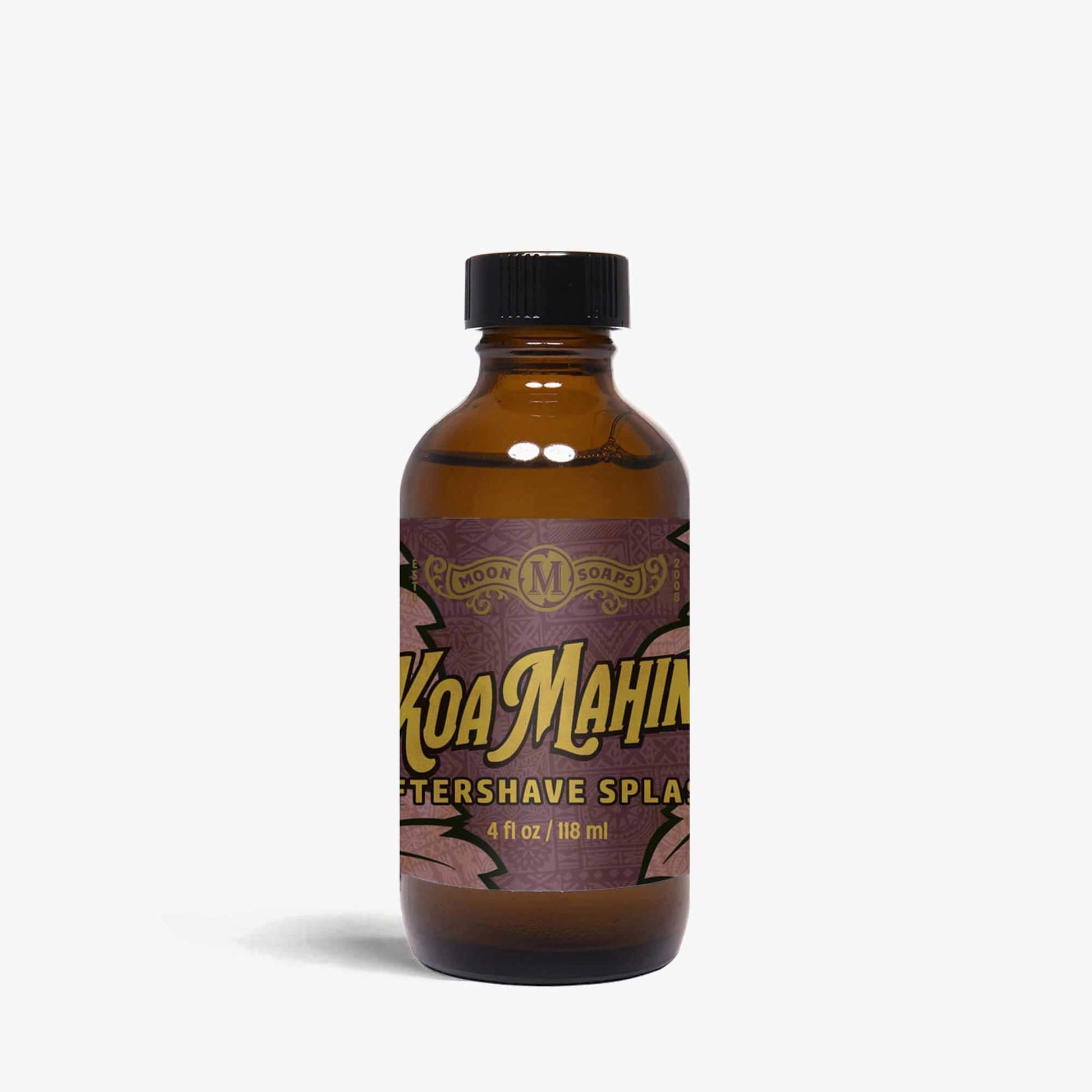 A bottle of Koa Mahin aftershave splash with a black cap on a white background